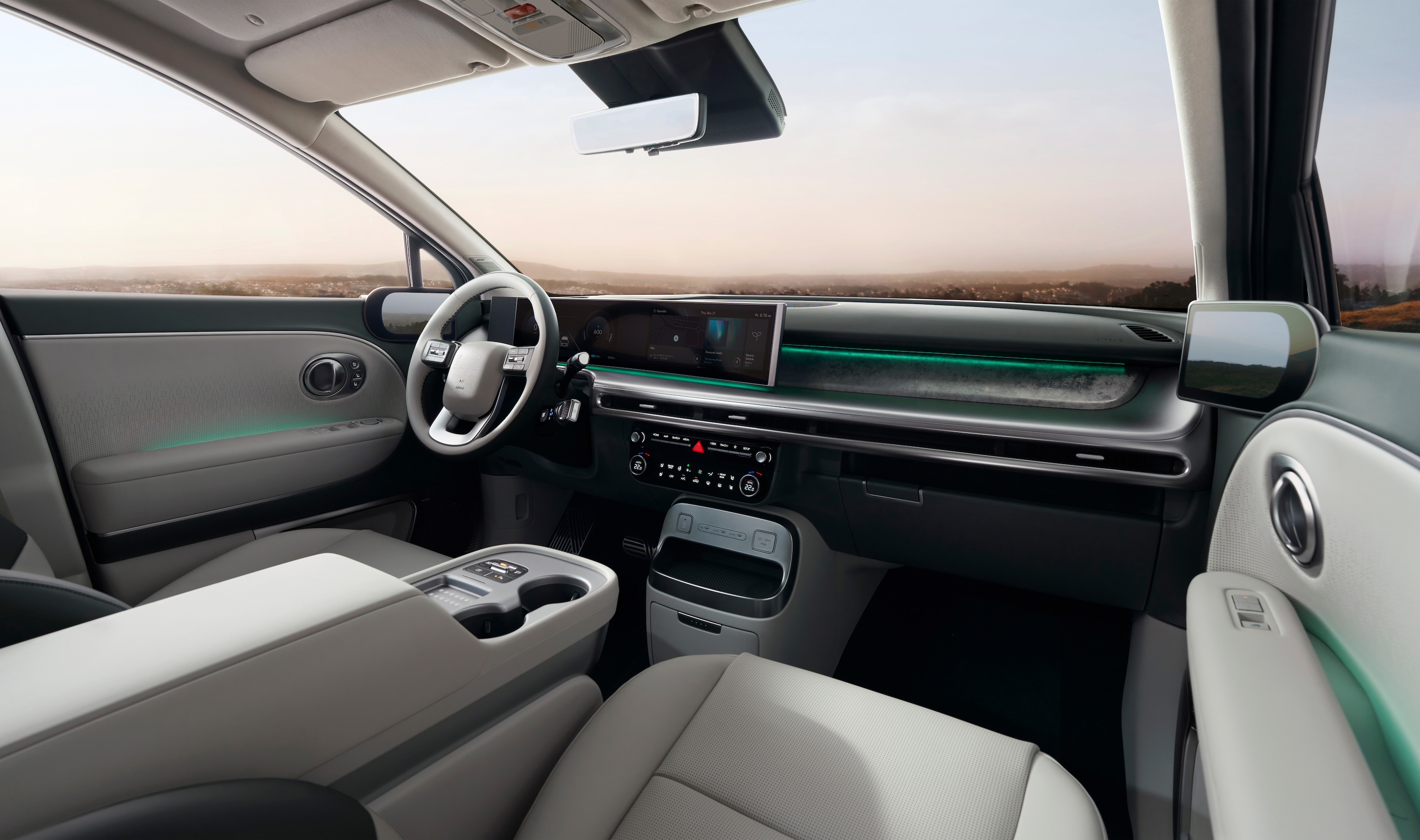 Interior of new Hyundai IONIQ 9 cockpit showing the integrated displays and both front seats.